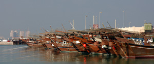 harbour view of a row of dohws in the middle east