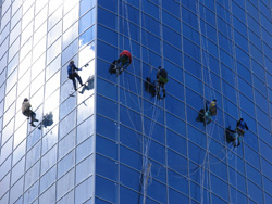Abseiling down glass tower