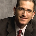 Amir Orad, President and CEO, NICE Actimize
