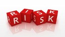 Picture of blocks spelling out word Risk